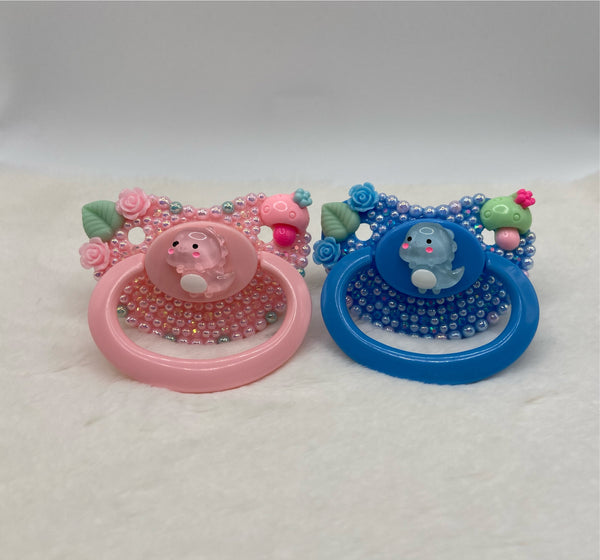 Pink and blue dinosaur matching set