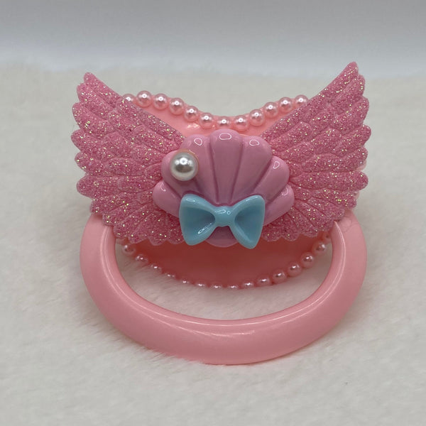 Pink shell paci